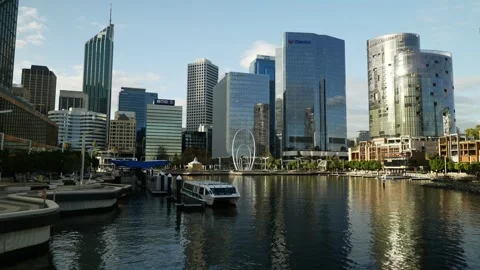 Arches of Spanda Sculpture surrounded by Perth skyscrapers 6K Stock Footage 311570729