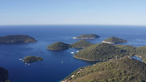 Archipelago of small islands in the middle of Adriatic ocean Stock Footage 120693702