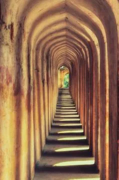 Architechtural building Pattern of yellow old columns in a historical royal b Stock Photos