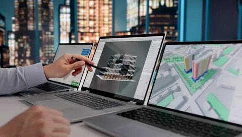 Architect Analyzing 3D BIM Model Designs On Laptop At Night, Engineering And  스톡 사진