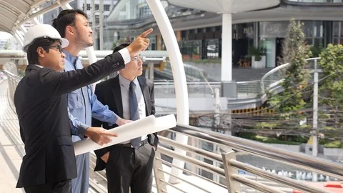 Architect and client at construction site Stock Footage 87002485