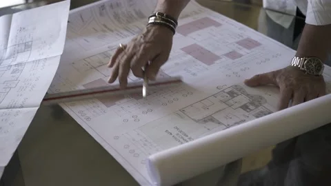 Architect and Client Discuss Blueprints Floor Plan Real Estate Vídeos de archivo 137833169