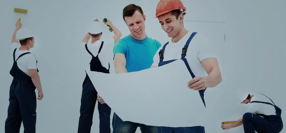 Architect and client discussing the plan of the building Stock Photos