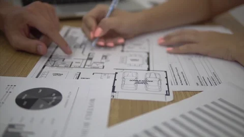 Architect and client at office workplace disscus information about building and 스톡 동영상 82537381