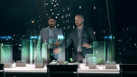 Architect and Designer Working on 3D City Holographic Augmented Reality Model Video stock 140811513