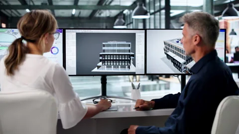 Architect And Engineer Collaborating Using BIM Software Stock Footage 335876840