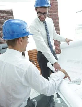 Architect and engineer, considering a building project Stock Photos