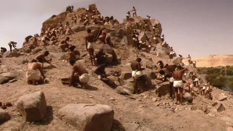 Architect and Engineer (Imhotep) walking near Pyramid construction - Reenactment Stockbeeldmateriaal 202907400