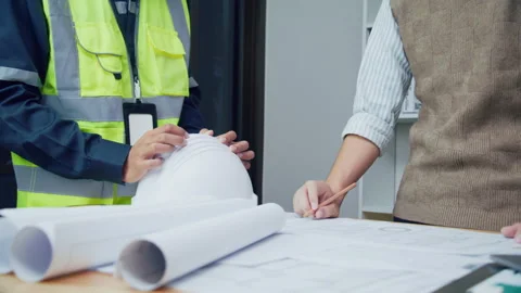Architect and engineer meeting and discussion in office Stock Footage 170406439
