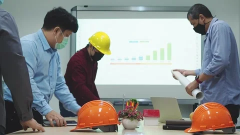 Architect and engineer prepare meeting documents before the meeting. Stock Footage 160591573