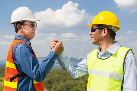 Architect and Engineer shake hand Stock Photos