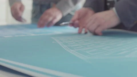 Architect and Engineer in a team discussing house blueprints Video stock 133054388