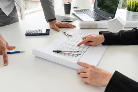 Architect and engineer working with drawing. Fotos de archivo