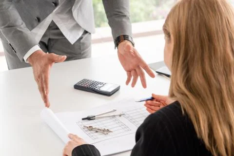 Architect and engineer working with drawing. Fotos de archivo