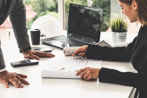 Architect and engineer working with drawing. Fotos de archivo