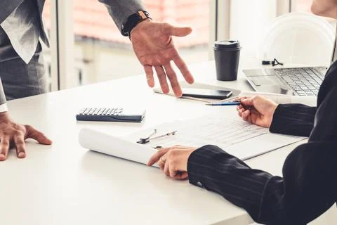 Architect and engineer working with drawing. Fotos de archivo