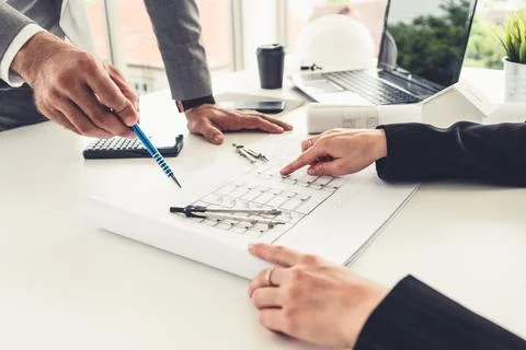 Architect and engineer working with drawing. Fotos de archivo