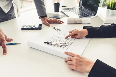 Architect and engineer working with drawing. Fotos de archivo