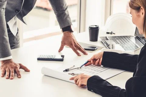 Architect and engineer working with drawing. Fotos de archivo