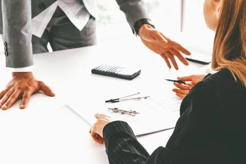 Architect and engineer working with drawing. uds Fotos de archivo