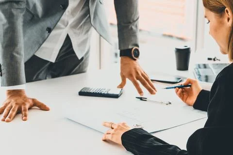 Architect and engineer working with drawing. uds Fotos de archivo