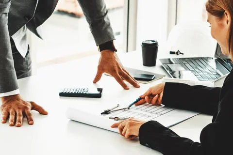 Architect and engineer working with drawing. uds Stock Photos