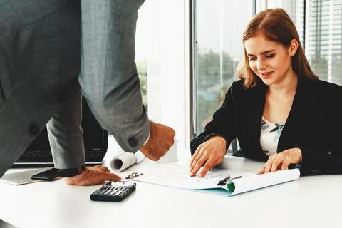 Architect and engineer working with drawing. uds Fotos de archivo