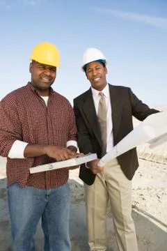 Architect And Foreman At Construction Site Stock Photos