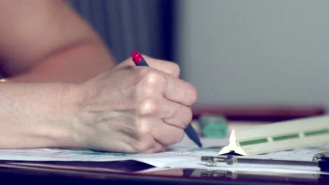 Architect and interior designer drawing plans on blueprints - hands only Stock Footage 226336657