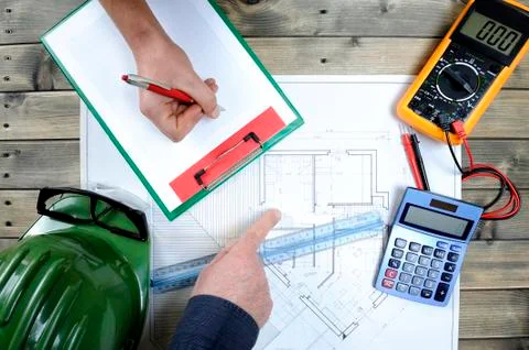 Architect and technician analyze the project of a residential house Foto stock