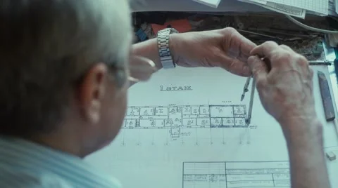 Architect applies compasses Drawing and draws a line in pencil Video stock 68147513