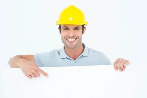 Architect with bill board over white background Stock Photos