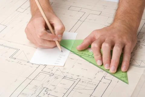 Architect with blueprint Stock Photos