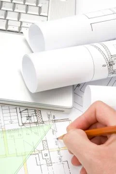 Architect with blueprints Stock Photos