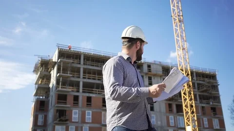 Architect browsing building project. 库存影片 70786197