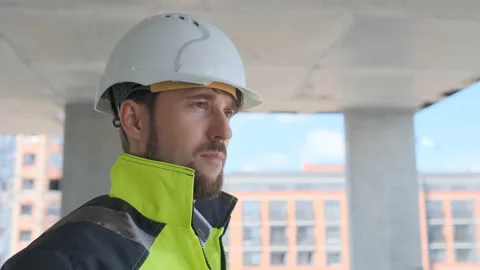 Architect Builder talking on the radio building under construction. Engineer in Video stock 113120846