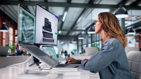 Architect Carefully Reviews 3D Building Model Stock Footage 337633623