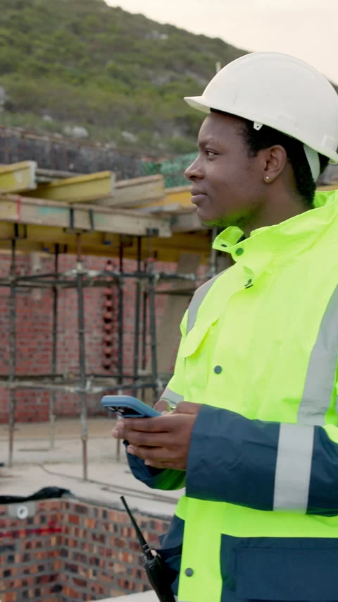 Architect, chat and man with phone on building site, thinking and communication Vídeos de archivo 338009154