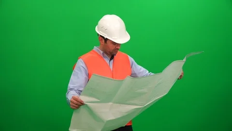 Architect Checking Technical Construction Drawings on Green Background Stock Footage 88652720