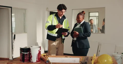 Architect, clipboard and handshake on site with supervisor, review blueprint or Stock Footage 341595764