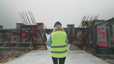 An Architect on a Construction Site 스톡 동영상 150890434