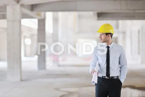 Architect on construction site Stock Photos