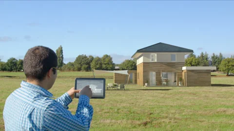 Architect creates a 3D house Stock Footage 32815459