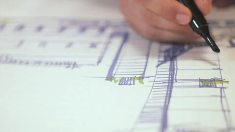 Architect Deep In Thought Reviewing Blueprint Plans Creative Problem Solving Stock Footage 284880124