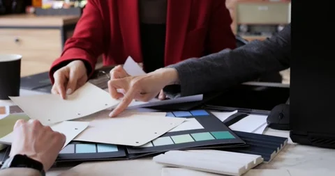 Architect designer and builder discuss color selection. Female team explores Stock Footage 275898990