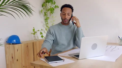 Architect designer engineer working on building plan project at studio office. Stock Footage 241860879