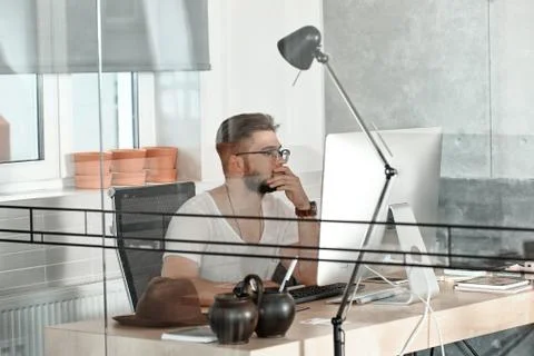 Architect-designer in the office Stock Photos