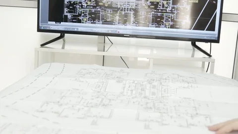 Architect, designer or engineers shaking hand in the office slow motion Stock Footage 99990157