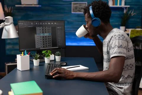 Architect developer wearing headset looking at building sketch 스톡 사진