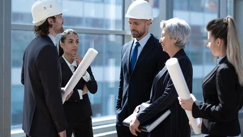 Architect discuss blueprint Stock Photos
